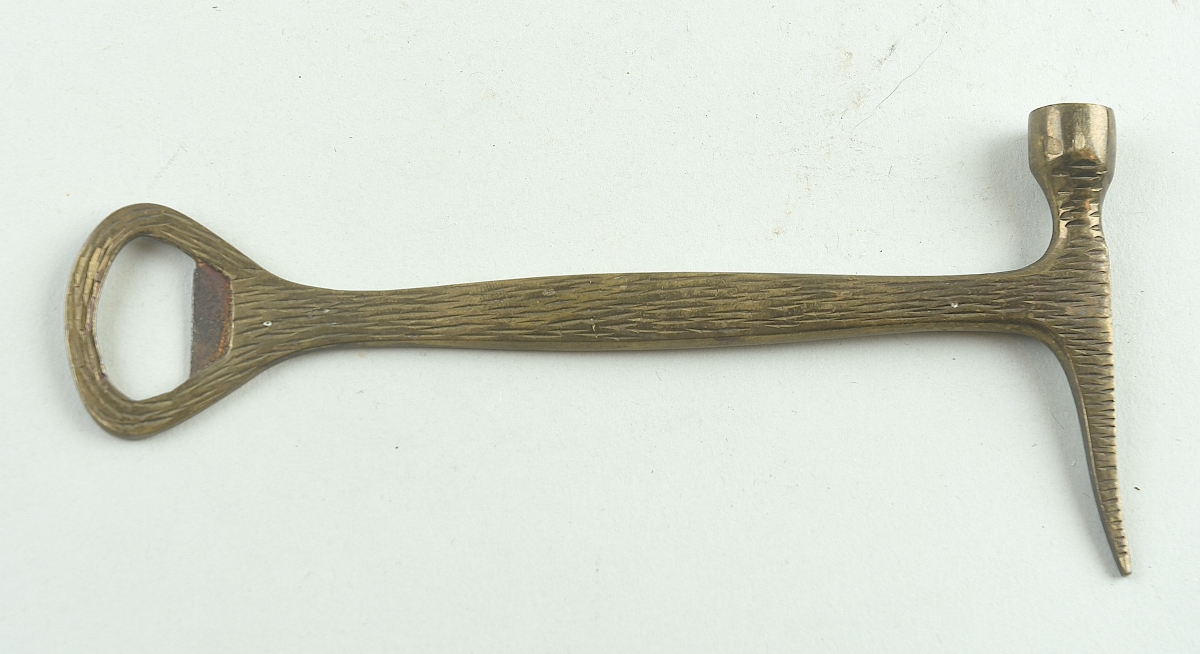 Small brass hammer with bottle opener end