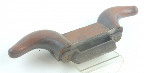 Ram's horn scraper with cast iron blade holder